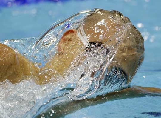 Hungary's Laszlo Cseh competes in a men's 200-meter breaststroke swimming heat at the Aquatics Centre in the Olympic Park during the 2012 Summer Olympics in London, Tuesday, July 31, 2012. (AP Photo/Michael Sohn)