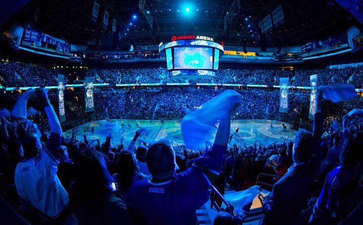 Fans wave towels as the Vancouver Canucks and San Jose Sharks take to the ice for game 1 of an NHL Western Conference quarter-final playoff hockey series in Vancouver, B.C., on Wednesday May 1, 2013. THE CANADIAN PRESS/Darryl Dyck