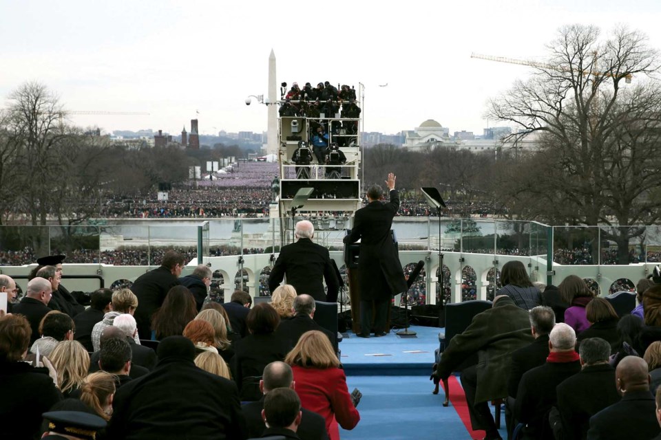 President Barack Obama waves during his ceremonial swearing-in ceremony during the 57th Presidential Inauguration, Monday, Jan. 21, 2013, on the West Front of the Capitol in Washington. (AP Photo/Win McNamee, Pool)