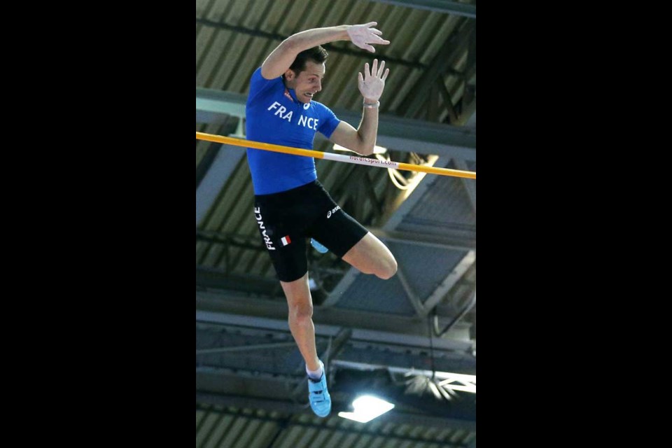 France's gold medal winner Renaud Lavillenie makes his final attempt that was disallowed later during the men's pole vault final at the Athletics European Indoor Championships in Gothenburg, Sweden, Sunday, March 3, 2013. (AP Photo/Matt Dunham)