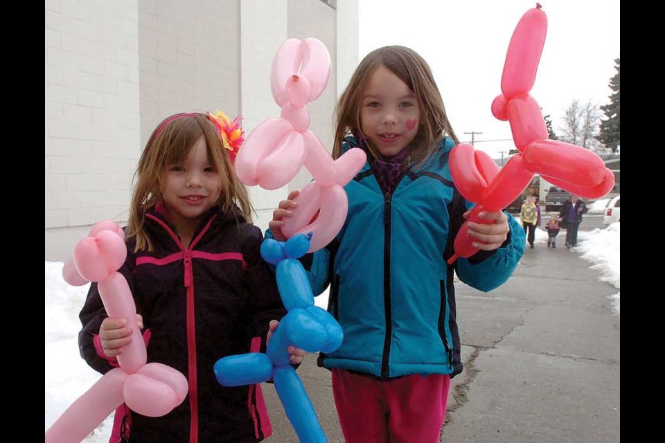 Kelsey Willier, 4, left, and sister Madison, 7, show off their ballon animals.
Feb. 18. 2013
Citizen photo by David Mah