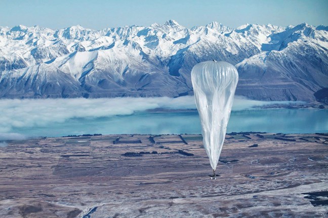 In this June 10, 2013 photo released by Jon Shenk, a Google balloon sails through the air with the Southern Alps mountains in the background, in Tekapo, New Zealand. Google is testing the balloons which sail in the stratosphere and beam the Internet to Earth. (AP Photo/Jon Shenk) EDITORIAL USE ONLY