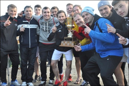 Men's open champions Athletico celebrate with the championship.