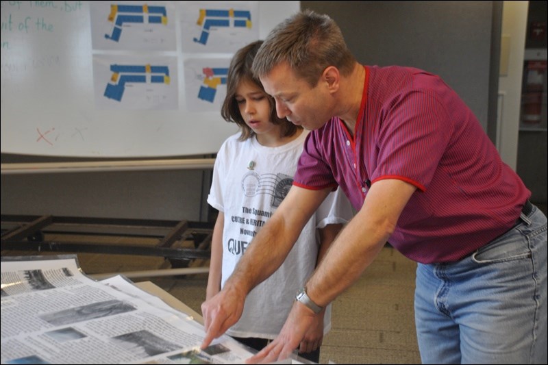 Eric Andersen teaches a young chap about the history of Squamish.