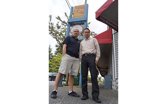 Davood Khatami (left) and Peter Tong are members of the Steveston Merchants Association. While merchant shave different opinions specifically on the Imperial Landing rezoning proposal, they are unified in limiting the amount of retail businesses on the boardwalk fearing it would water down the market.