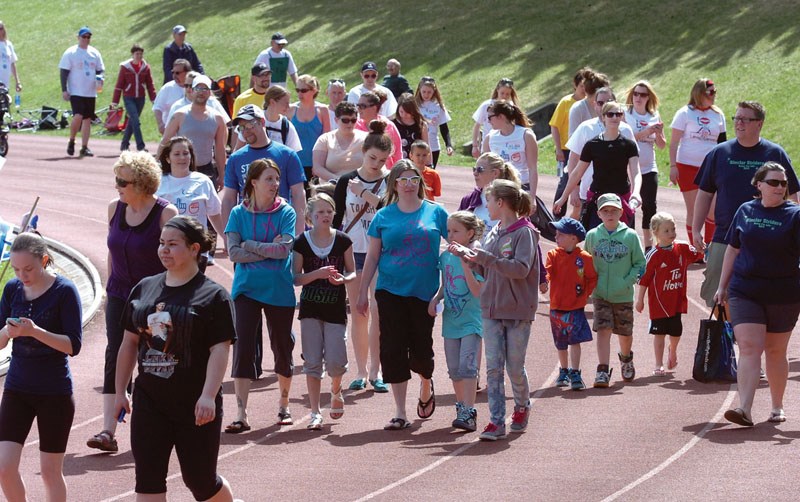 Some of the 1445 participants in the 2014 Relay for Life held at the Masich Place Stadium.