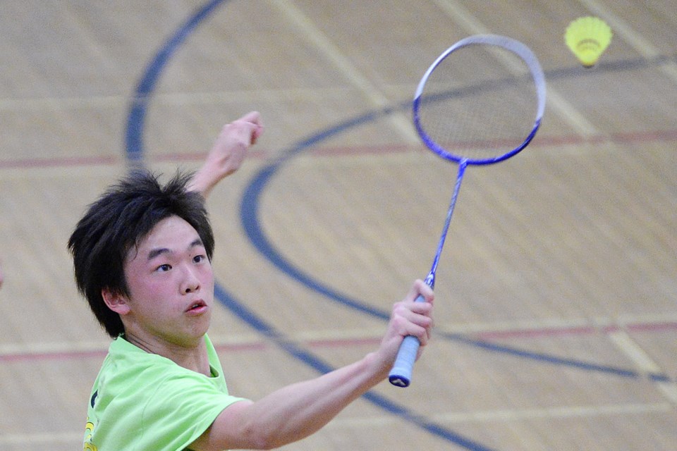 Killarney's Felix Law in a doubles boys match against Prince of Wales in the senior badminton city final at Killarney May 9, 2014.