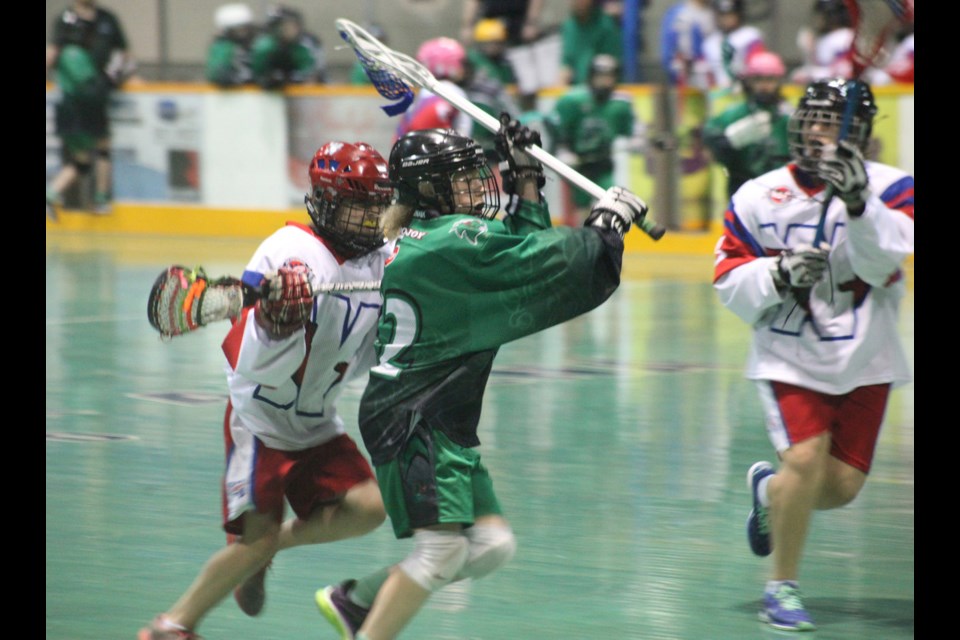 05-11-2014
Burnaby (green) vs. NW peewee girls lacrosse, Dorothy Robertson Memorial jamboree.
photo Jason Lang