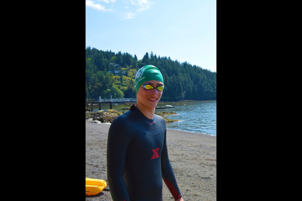 Willem Young in his wetsuit, at Sealeigh Beach. Tri4Ghana was born out of Willem’s desire to attempt a swim from the North Shore to Bowen Island