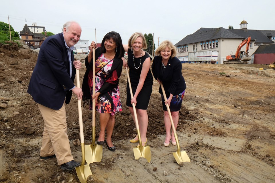 From left, New Westminster Mayor Wayne Wright, Qayqayt Chief Rhonda Larrabee, school board chair Jonina Campbell, and North Vancouver-Seymour MLA Jane Thornthwaite, plunge their shovels into the dirt at the official ground breaking ceremony for the new École Fraser River Middle School, slated to open in September 2015.