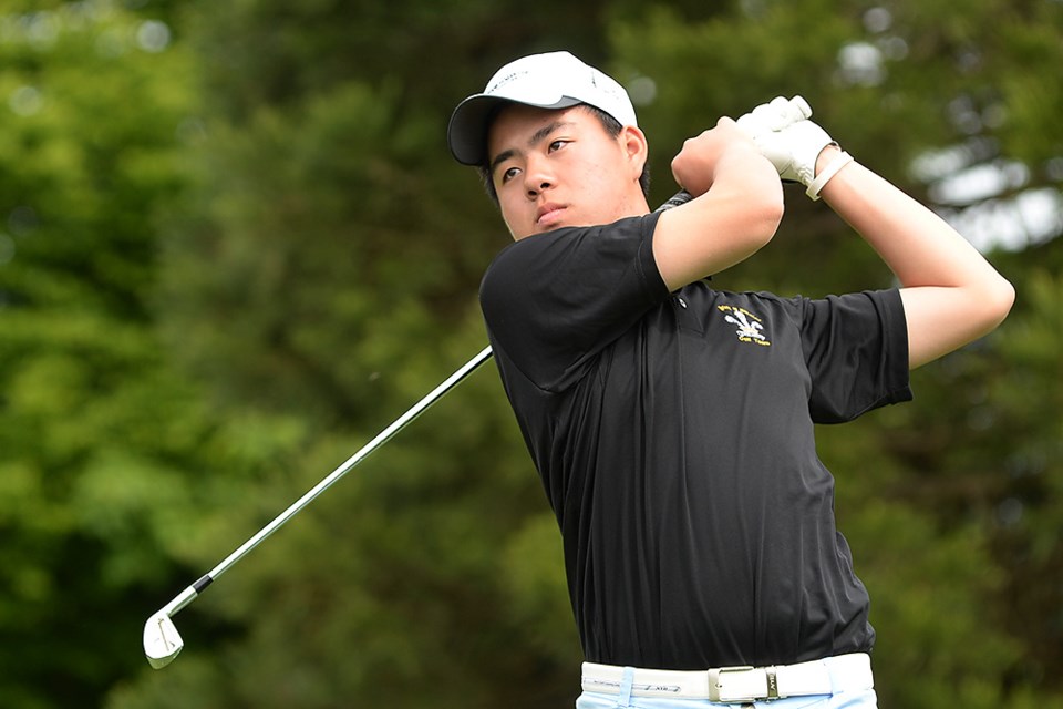 The Walesmen’s Jordan Lu tees off on the par-three third hole at McCleery Golf Course. He led the field with a five-under-par 66 at the city golf championship on May 15, 2014.