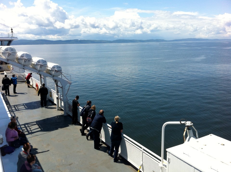 Out on the deck of Spirit of Vancouver Island ferry admiring the scenery.