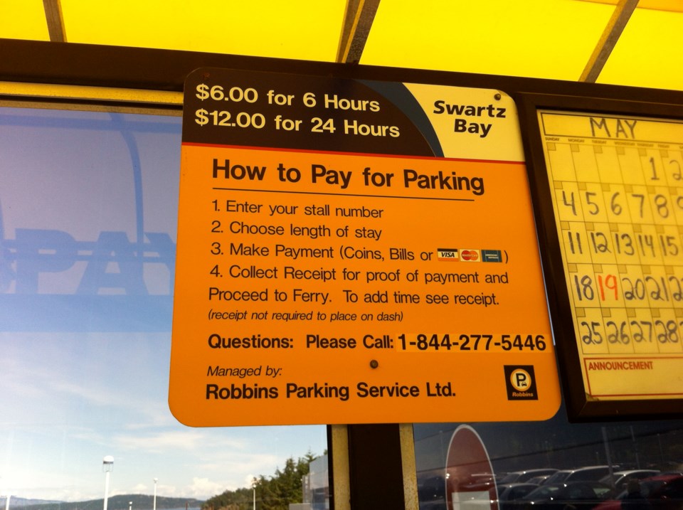 Parking payment instructions at the Swartz Bay terminal long-term parking lot.