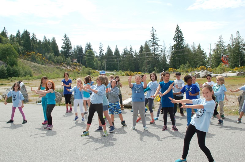 Students from West Sechelt Elementary School held a flash mob to spread some happiness at Tsain Ko Village and Trail Bay Mall on Wednesday morning. See more photos and video at www.coastreporter.net