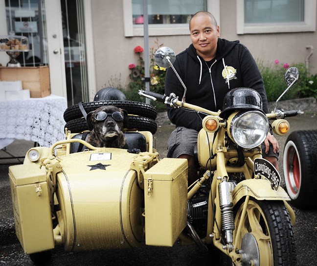 East Van Show and Shine founder Erv Salvador with his 1965 Chinese military motorcycle. Salvador, who also owns The Whip Restaurant and Gallery, is often seen in the city riding the vintage bike with dog Beau in the sidecar. Photograph by: Rebecca Blissett
