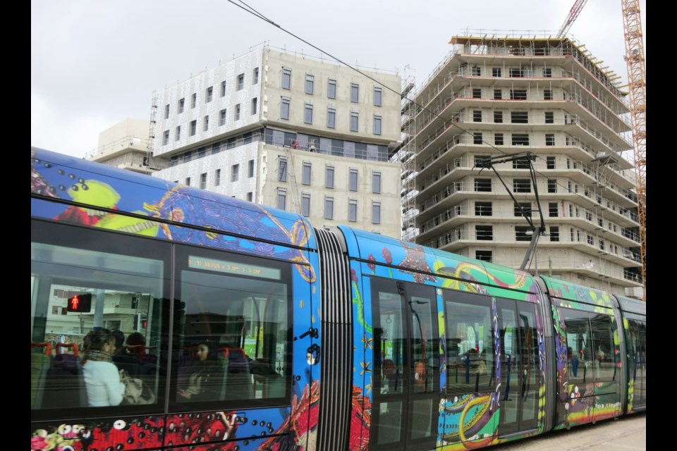Montpellier's decorated trams glide along designated lanes, which in many areas are landscaped. Photo Michael Geller