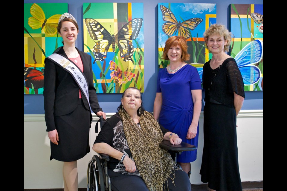 From left, Miss New West Claire Dresselhuis, resident Mable Crocker, Queens Park Healthcare chairperson Lorraine Brett and artist Jill Doyle with the new artwork donated by Doyle to Queen's Park Care Centre.