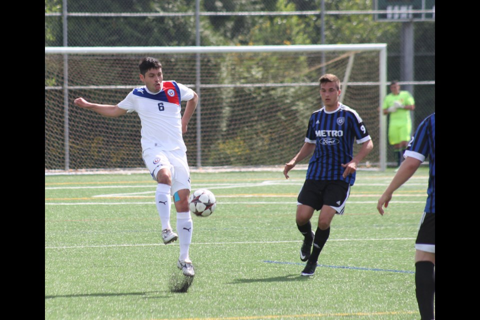 05-24-2014
EDC FC Burnaby (blue) vs. Coquitlam Metro Ford, premier mens soccer.
photo Jason Lang