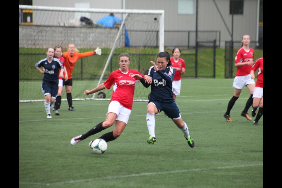 05-25-2014
Vancouver Whitecaps (blue) vs. Peninsula Co-op Highlanders, pacific coast league premier womens soccer.
photo Jason Lang