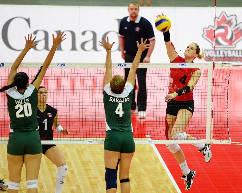 Roberts Creek’s Kyla Richey, right, goes up for a spike in Team Canada’s win over Mexico at the NORCECA Women’s World Championship qualification tournament at the Hershey Centre in Ontario. Canada won the match in three sets to qualify for the world championships this September in Italy.