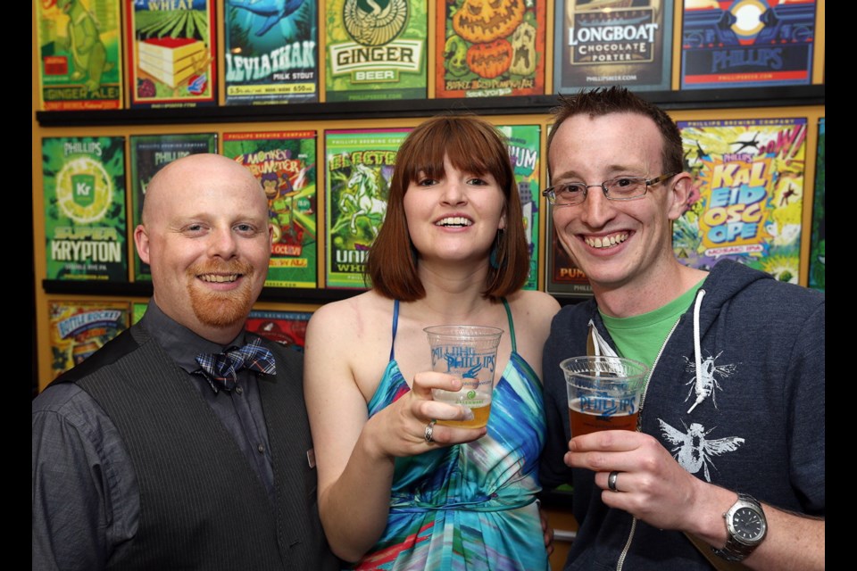 Intrepid Theatre technical staff Theodore R. Sherman, left, Emma Dickerson and Ben Burrow.