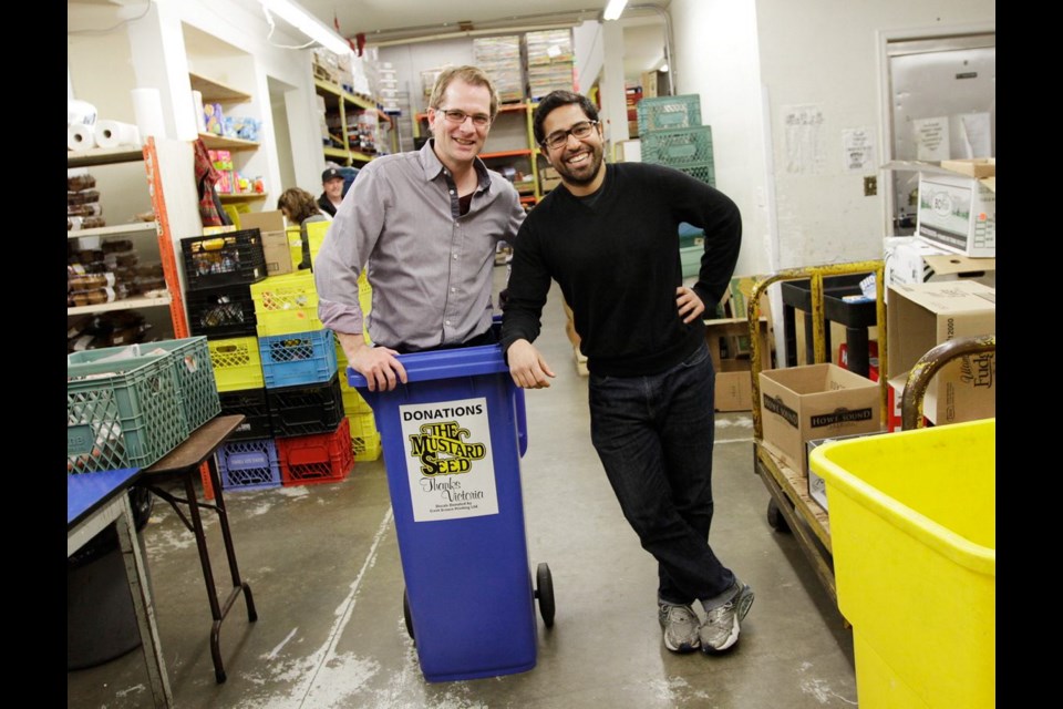 Paul Latour of Hero Works, left, and Rudi Wallace, assistant food-bank director at the Mustard Seed Food Bank.