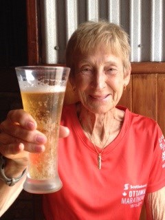 Gwen McFarlan, 80, celebrates breaking the world record for marathon running in her age group