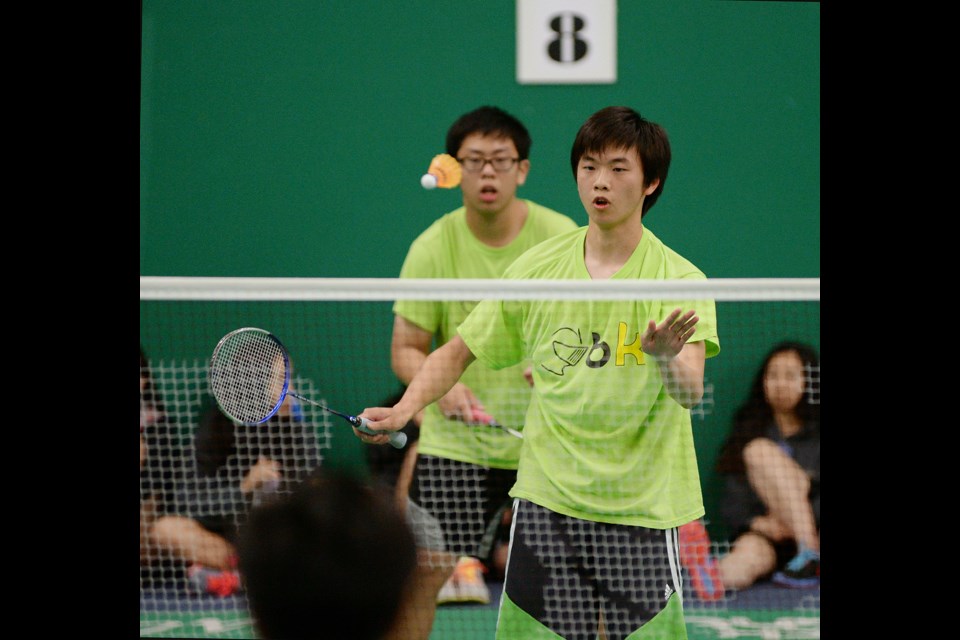 Killarney boys doubles pairing of Felix Law (foreground) and Hayden Yee played Steveston London at Ace Badminton on May 30, 2014.