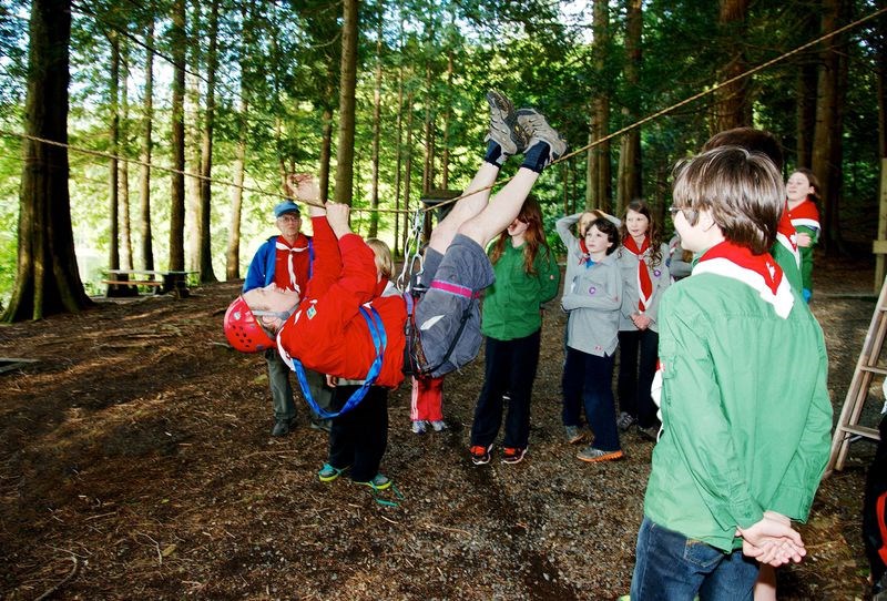 Scout leader David Jones demonstrates the Tyrolean traverse.