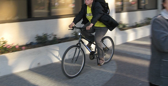 sidewalk cyclist
