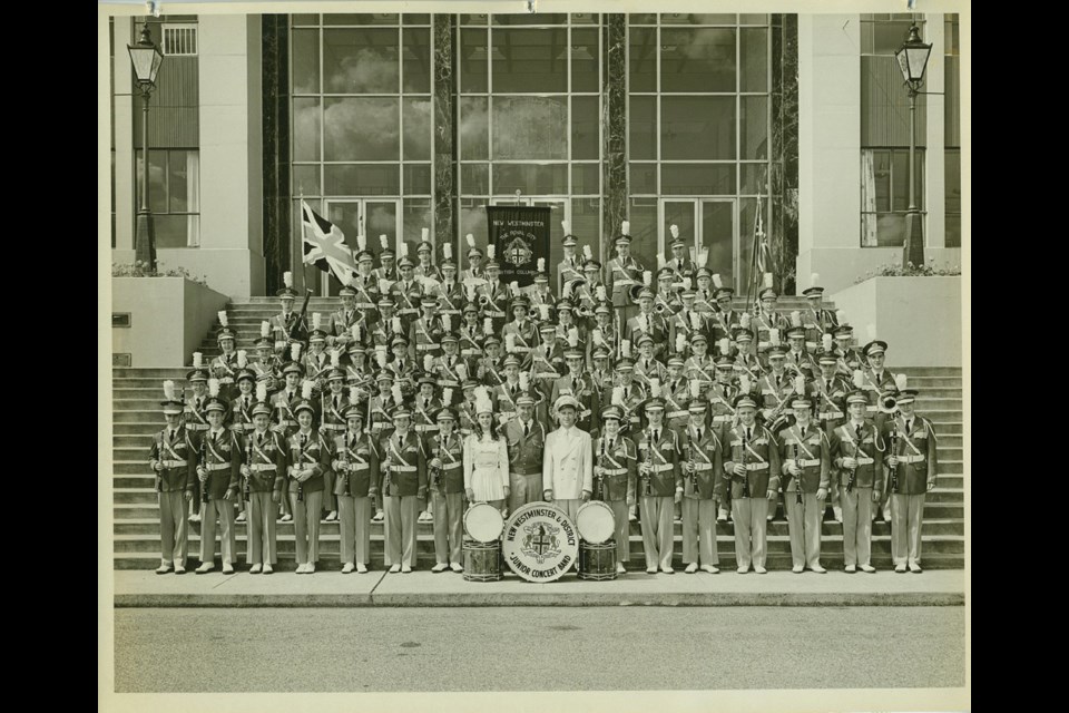 The New Westminster and District Band on the steps of city hall prior to a cross-Canada tour in 1959. The group marks its 80th anniversary this weekend.