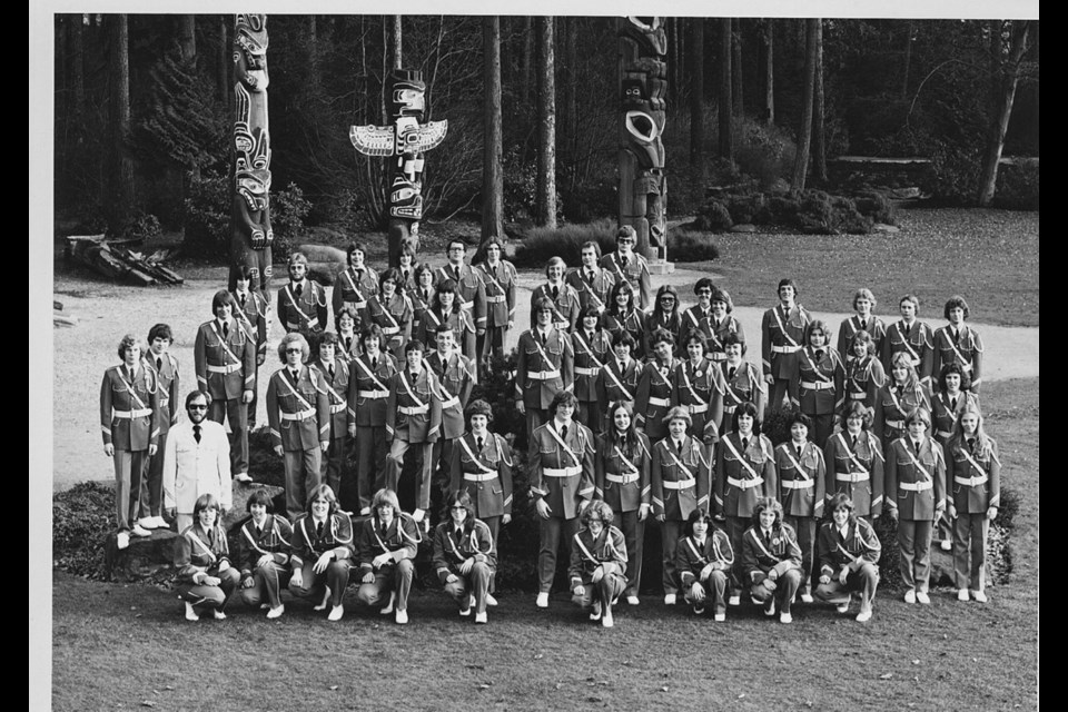 The New Westminster and District Band poses in front of the Stanley Park totem poles prior to a European trip in 1978.