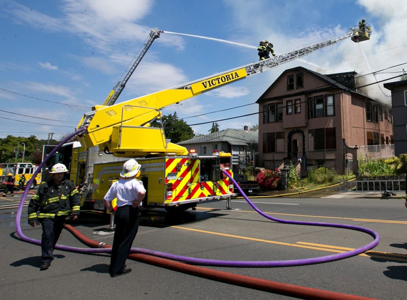 Victoria firefighters battle an apartment building fire on Cook Street on Thursday, Jun 12, 2014.