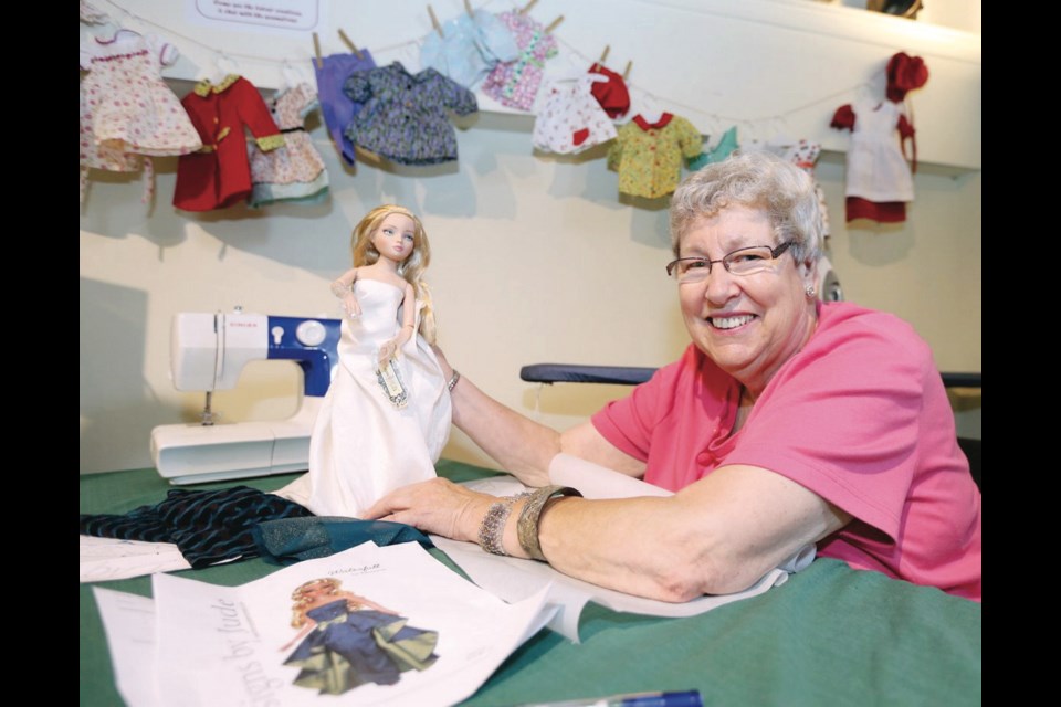 Doll dressmaker and volunteer Isabel Jones. "This is an opportunity for me to make wonderful fashions I can no longer wear, but still enjoy," Jones says.