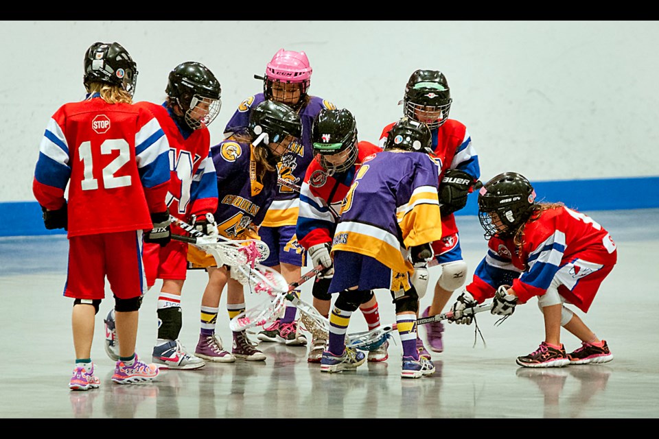 061514 - New Westminster, BC
Chung Chow photo
New Westminster Salmonbellies Tyke Girls lacrosse at Moody Park Arena.
Their last home game of the season.
Salmonbellies (red) vs Coquitlam
Contact Rebecca Fruhm (604-612-7601) for more details