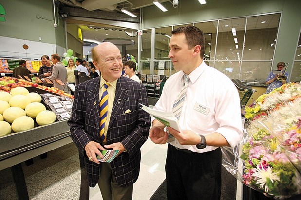 Jim Pattison chatted with operations manager Israel Martens at the grand opening of Save-On-Foods in Westminster Centre in July 2009. The store is set to close, but Save-On will continue to have an uptown presence at its new Royal City Centre location.