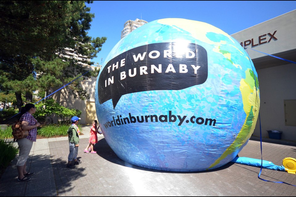 Giant inflatable globe outside the Bonsor Rec Complex welcomes people to the Multicultural Festival.