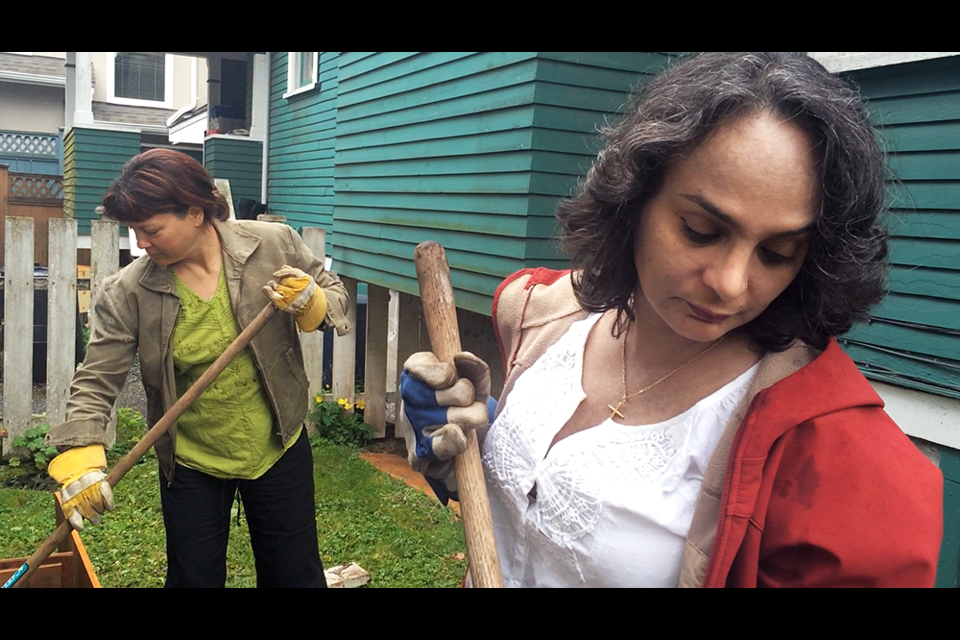 From left, Luci Baja and Sonya Govahi are the first pair set up through Sharing Backyards, a new program from Burnaby Food First. Baja has extra space on her property, and Govahi is using to the grow food. The two will share the harvest.