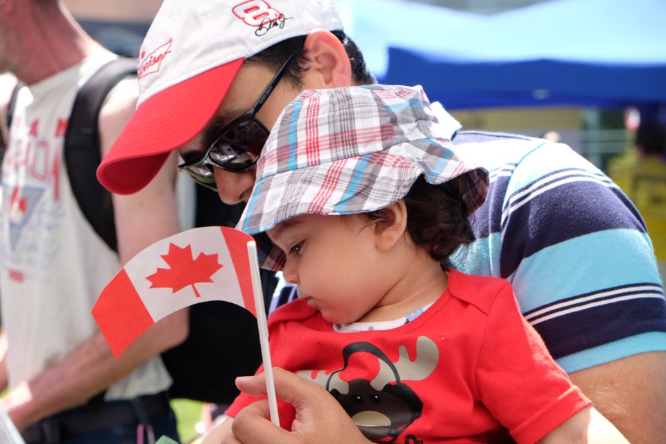 Ankur and 14-month-old Kartik at the Canada Day celebrations held at Edmonds Community Centre.