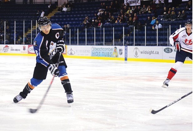 WV hockey player makes a move