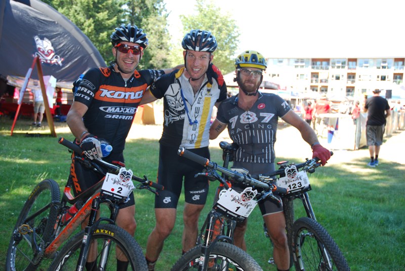 Sechelt’s Kris Sneddon, centre, won stage four of the BC Bike Race Wednesday afternoon. Spencer Paxson, left, finished third, and Tristan Uhl came in second. See more photos and video online at www.coastreporter.net