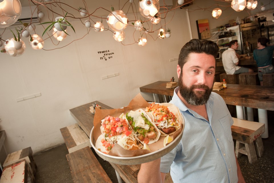 Tacofino managing partner Gino Di Domenico serves up a taco trio with crispy ling cod, albacore tuna, and pork jowl.