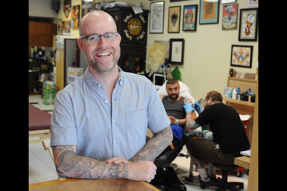 Chad Woodley, owner of Sanitary Electric Tattoo Company on Fraser Street. Photo Dan Toulgoet