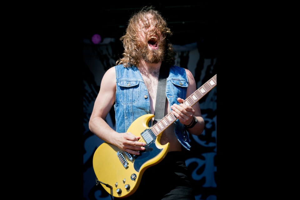 Monster Truck guitarist Jeremy Widerman performs.