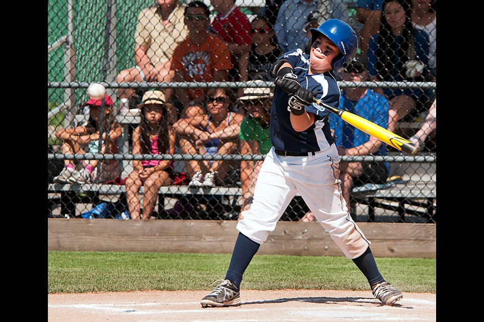 South Vancouver slugger Evan March cranked the ball to deep centre field for a three-run home run in a 9-3 win over Little Mountain in a round-robin game at the B.C. Little League Championship in Walnut Grove July 21.