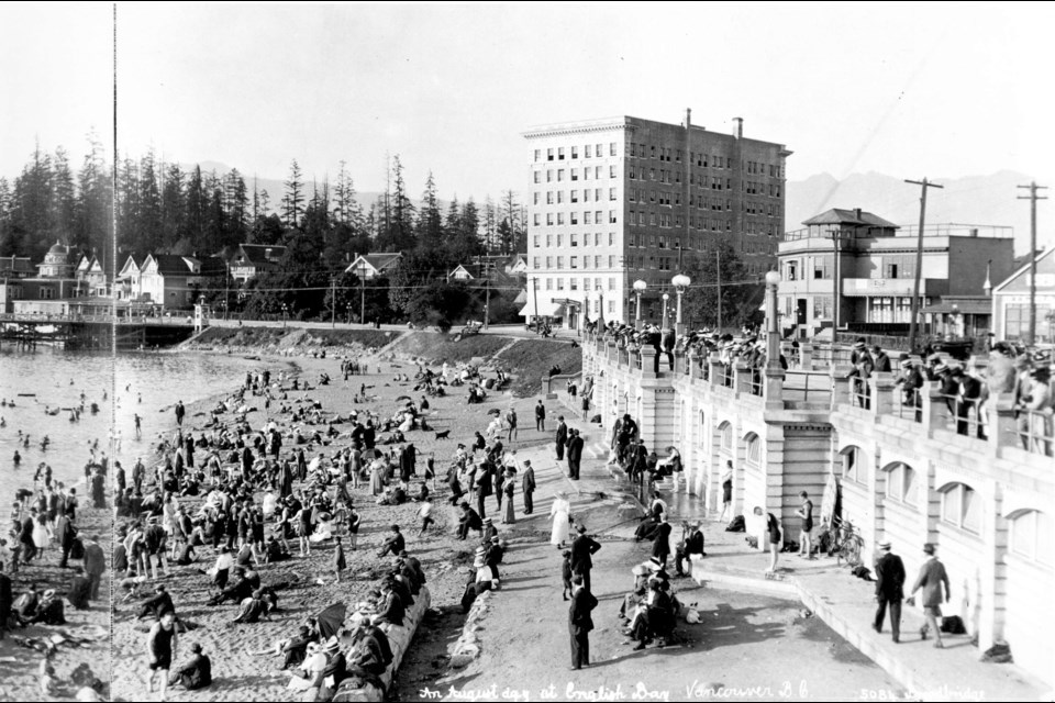 “Bathers” enjoy the beach at English Bay in August 1914. The Sylvia Hotel is the large building at centre. Englesea Lodge was located just outside of this picture, to the left. Photo Richard Broadbridge, City of Vancouver Archives AM54-S4-: Be P144.2.