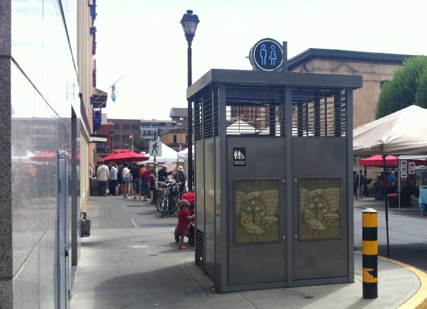 Unisex toilet stall on Langley Street sidewalk near Bastion Square.