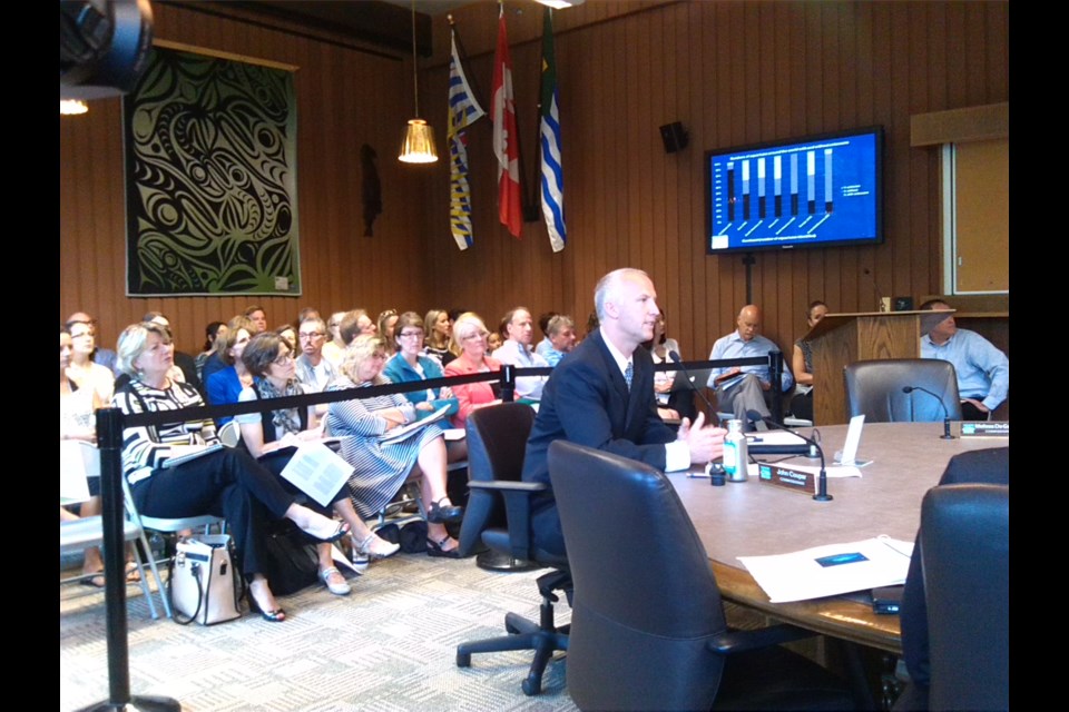 The meeting opened with a speech by Joseph K. Gaydos, chief scientist at the UC David Wildlife Center's SeaDoc Society Program. He was hired by the park board to "provide a non-biased, third party review" of how the aquarium's cetacean program compares to comparable aquariums. Photo Stanley Tromp
