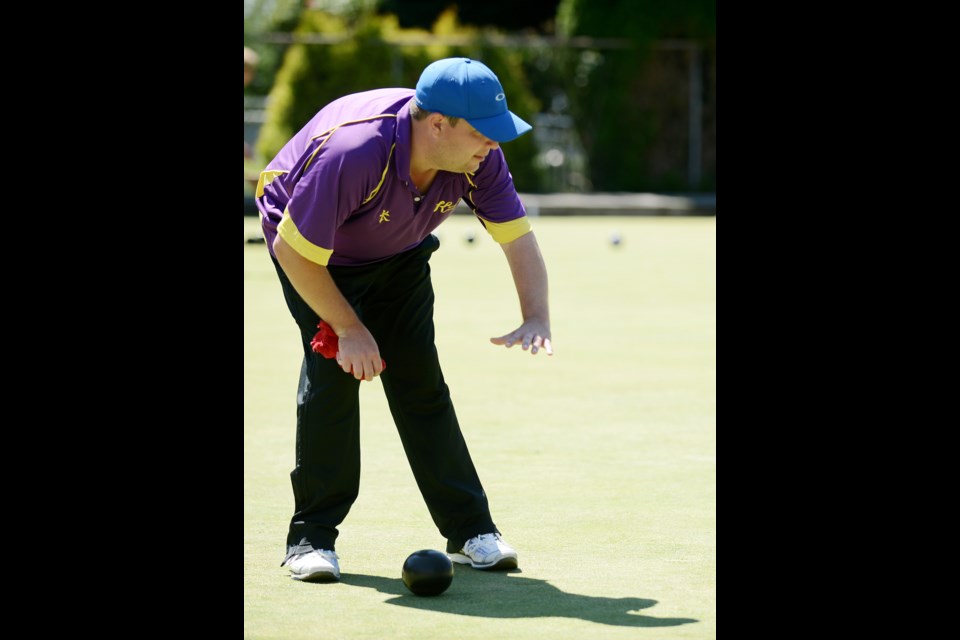 Teams from Kerrisdale play in the gold medal game of the men's B.C. Pairs championships at the New West Lawn Bowling Club,
