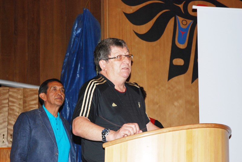 Sechelt Nation Coun. Garry Feschuk (right) contrasted the seniors governments’ continued denial of Aboriginal rights to the willingness of local governments to work in partnership with First Nations. Chief Calvin Craigan stands behind him.